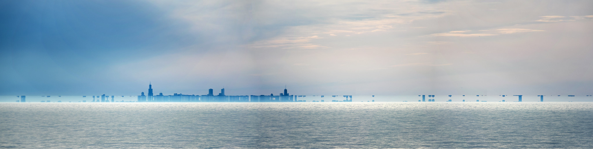 Superior mirage lifting Chicago skyline above Lake Michigan.
